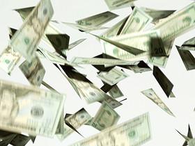 CU, Twenty dollar bills falling against white background