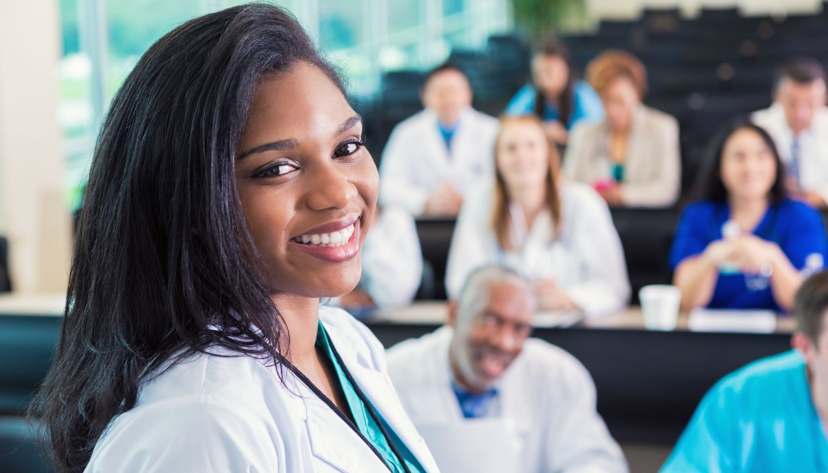 African American doctor or medical professional attending healthcare conference