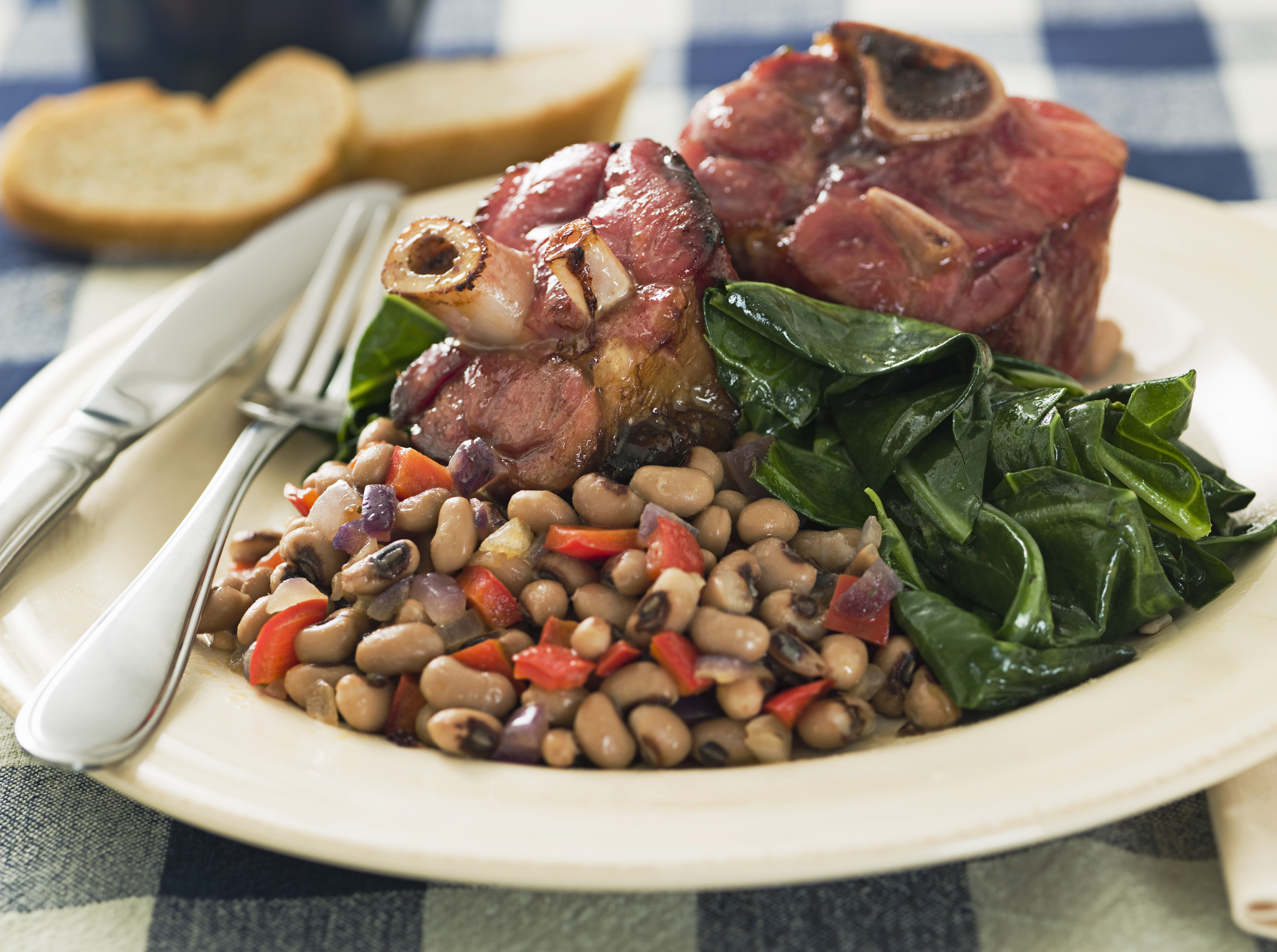 Southern New Year's meal with greens, beans, and ham hocks