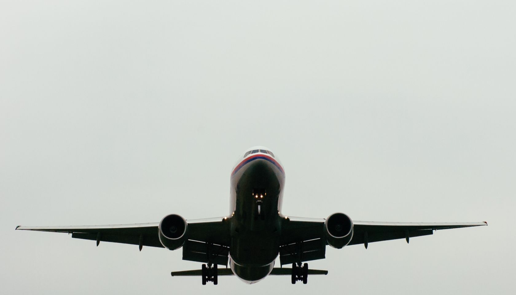 Low Angle View Of Airplane Against Clear Sky
