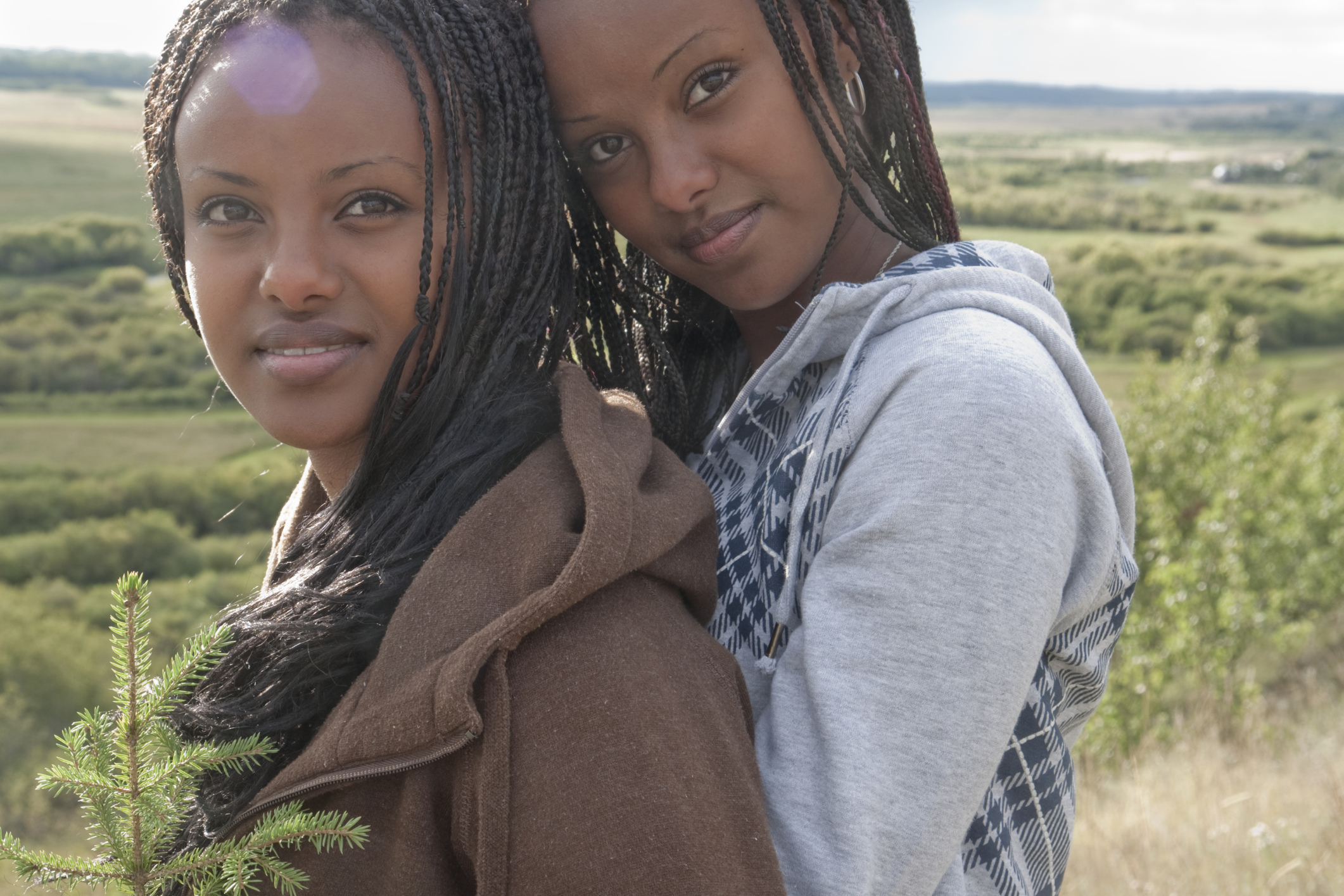 Portrait of twin teen girls, close-up.