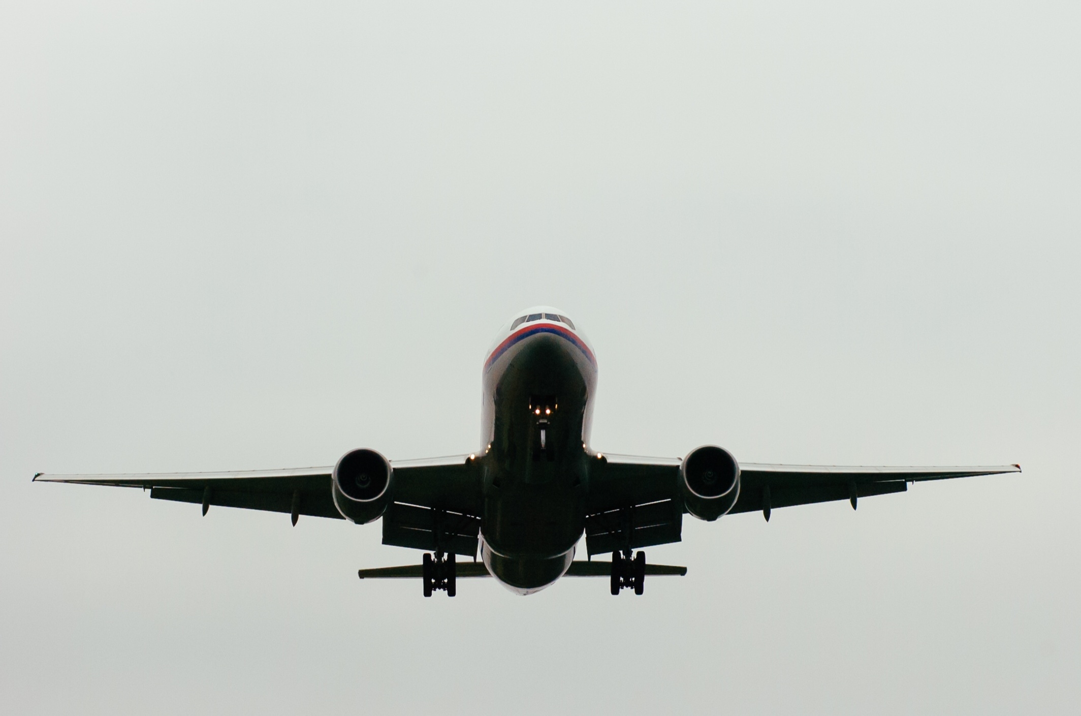 Low Angle View Of Airplane Against Clear Sky