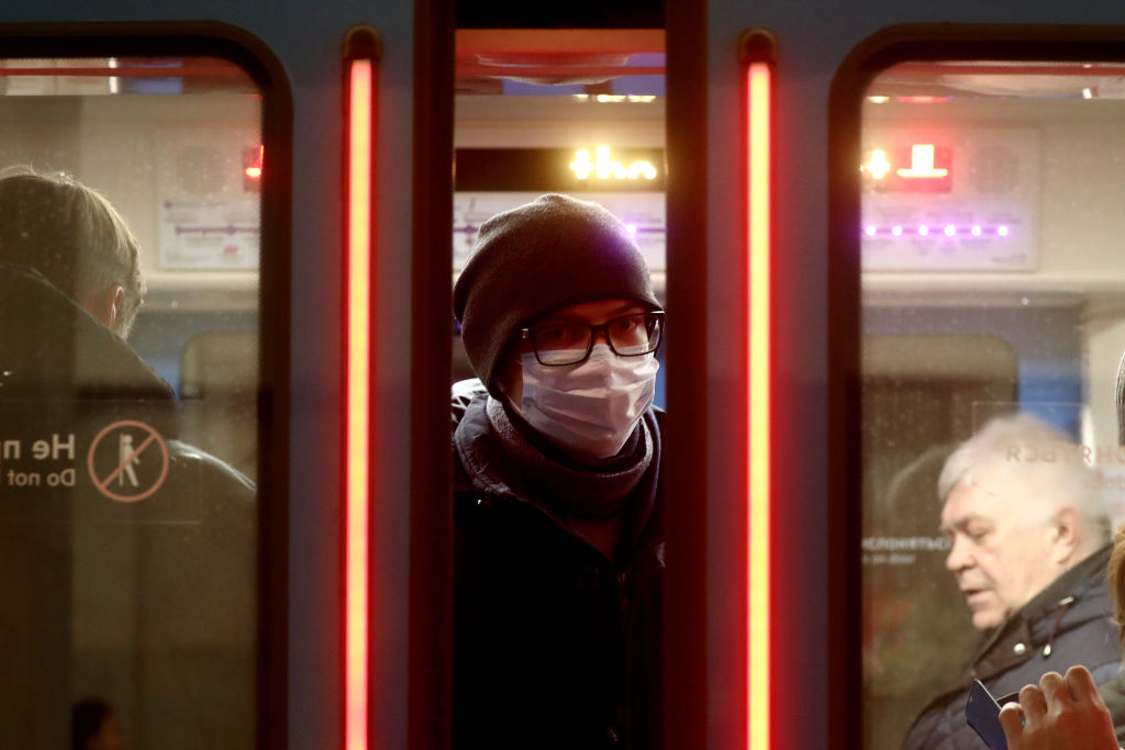 Commuters wear face masks on Moscow Underground
