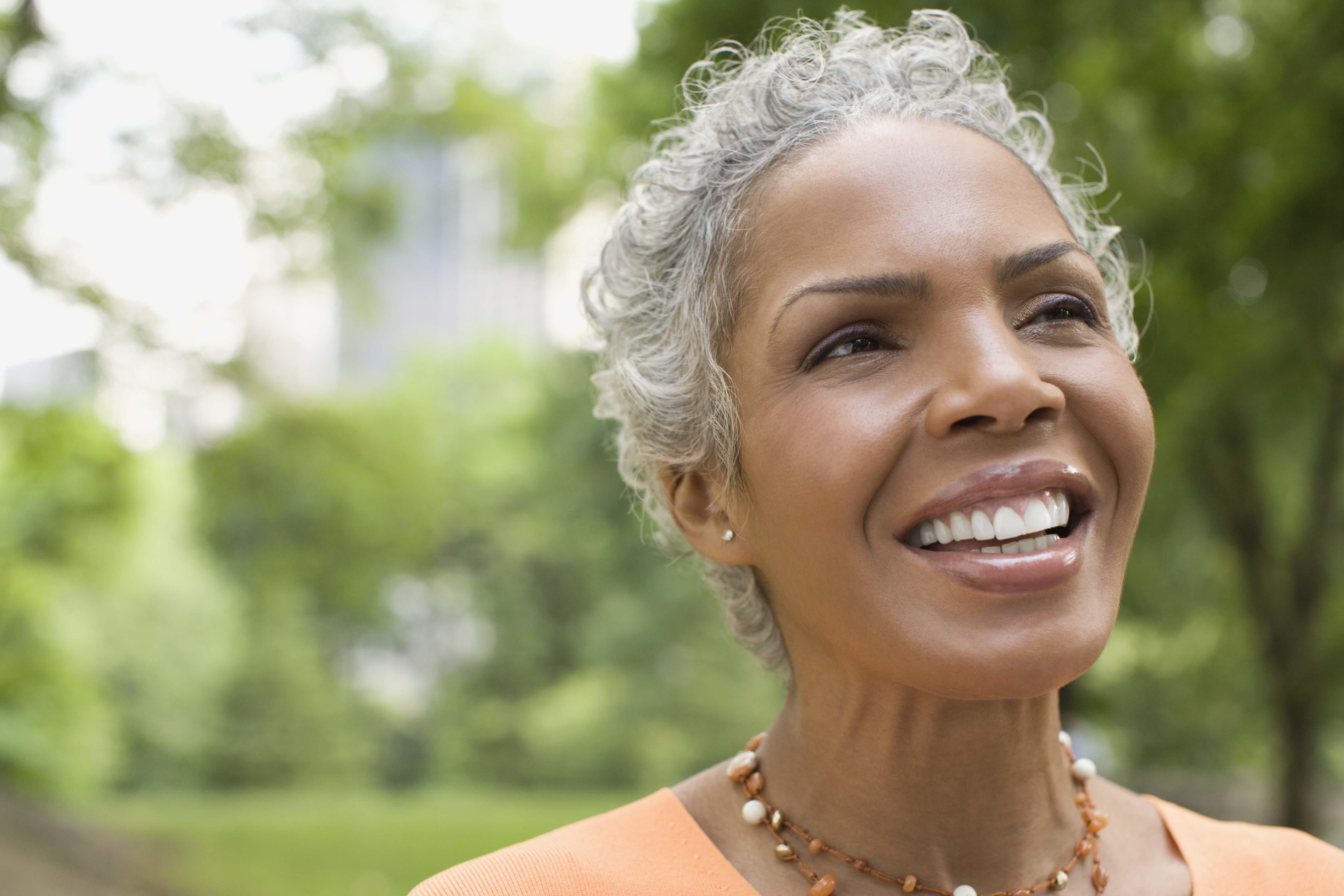 Smiling woman looking away