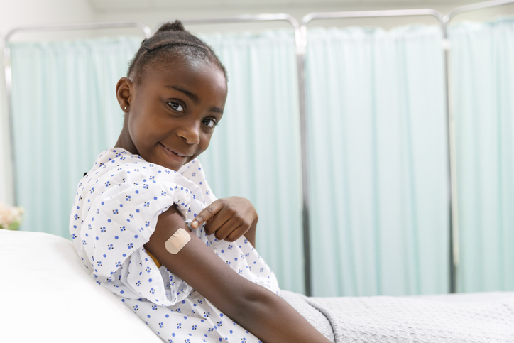 Portrait of happy child after receiving a vaccination