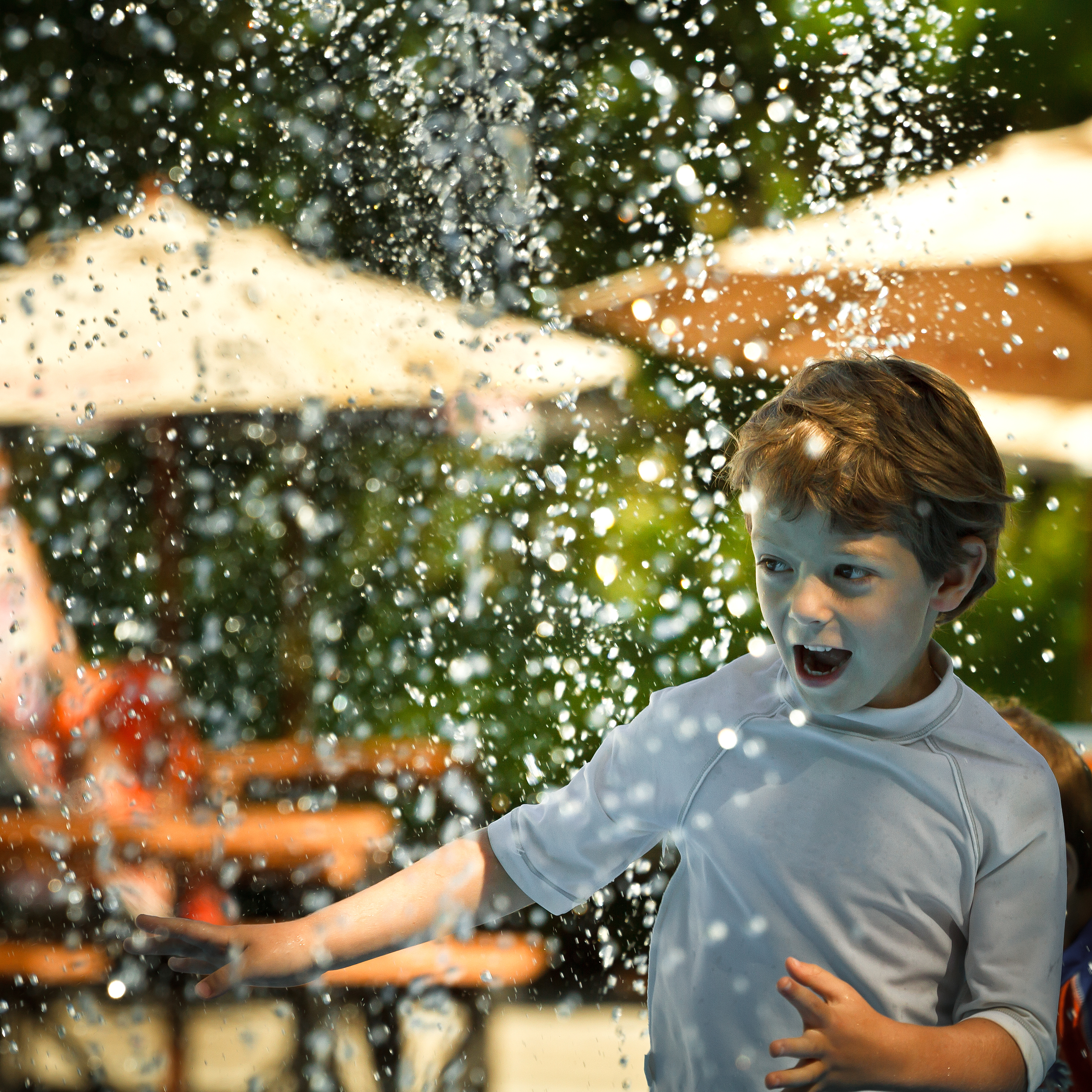 Boy splash water park