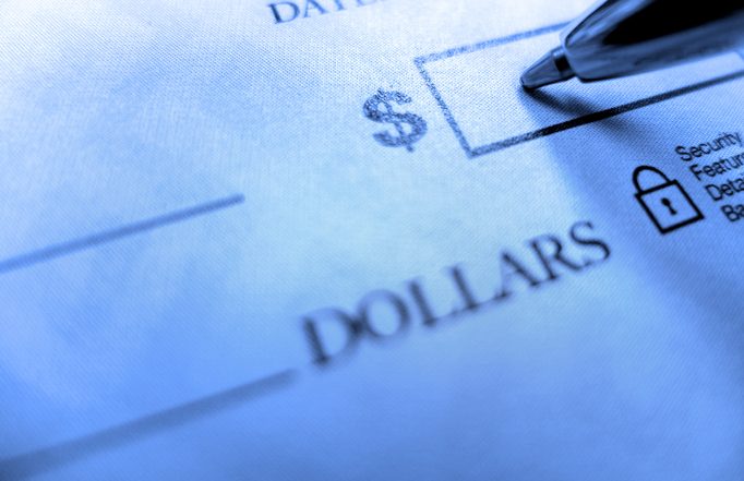 Pen Writing Check for Payment of Dollar Amount Pay to the Order of