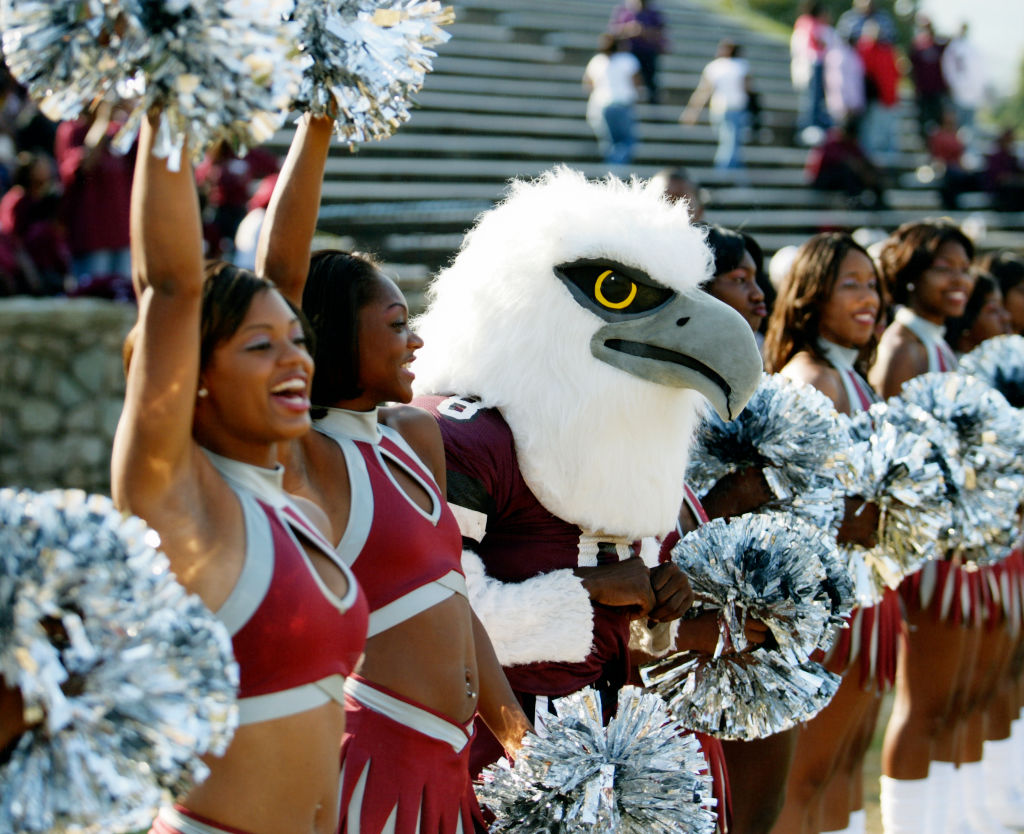 Women cheering at arena